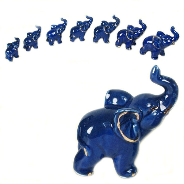 Figuren-Set "7 Elefanten", aus Porzellan, Figurenhöhe von 8,5 cm bis 4,5 cm